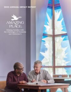 Cover of 2022 Annual Report, image of Bible study leader and participant discussing a passage